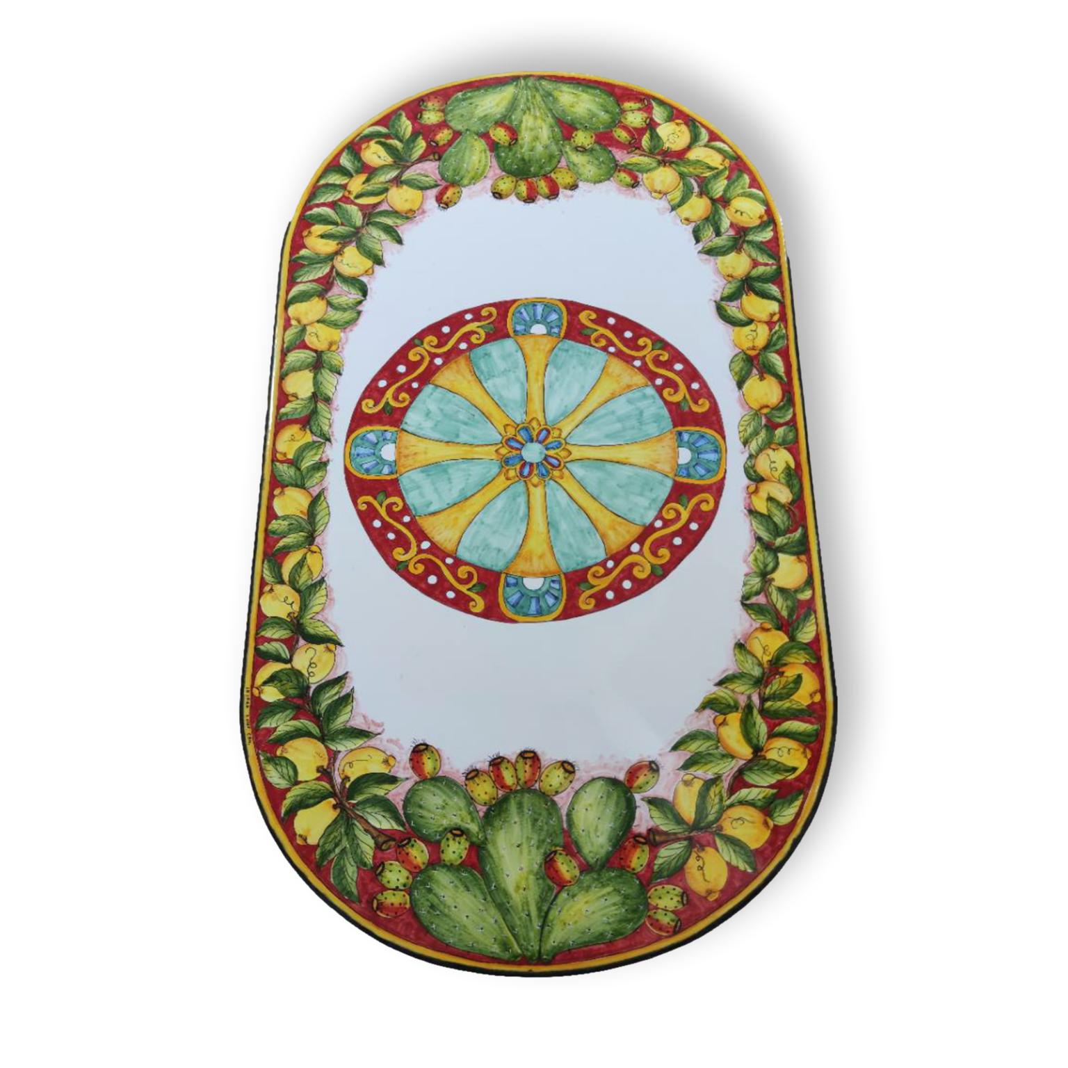 Tavolo in Pietra lavica ovale - Ruota di carro in rosso e giallo con limoni e fichi d'india