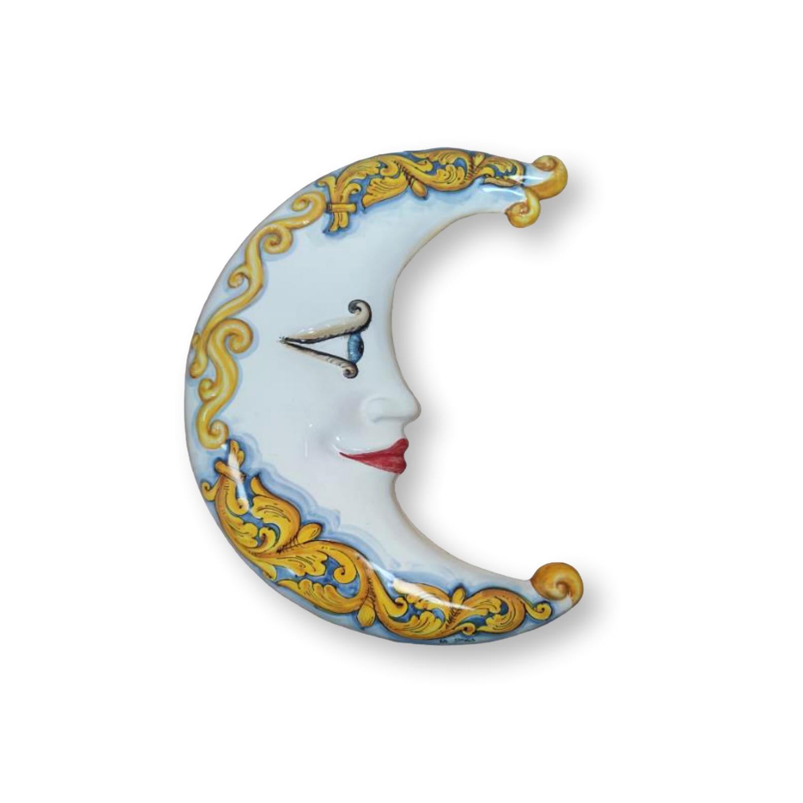 Luna in ceramica con ornamenti gialli